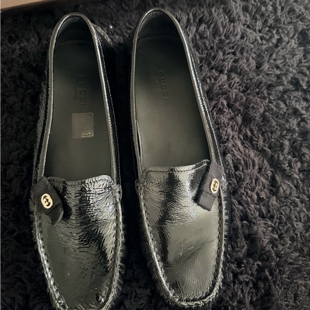 Gucci Black Patent Leather Slip-On Loafers with Gold Logo